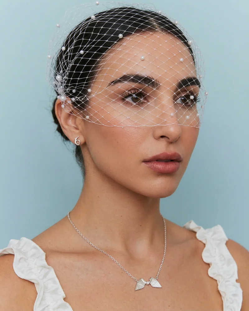 Amaya Lala in a crystal birdcage veil, luxury beauty editorial from the LoveYours Collection jewellery campaign