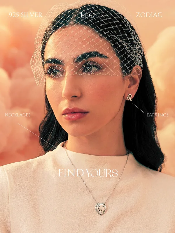 LoveYours Collection Leo zodiac campaign, Amaya Lala facing camera with a 925-silver pendant, soft-cloud editorial portrait